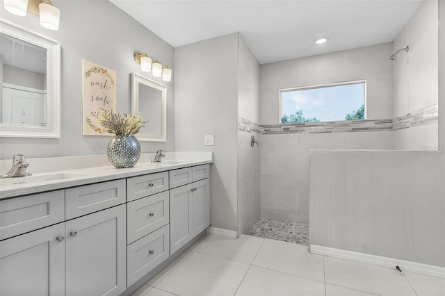 1731 NW 24th Pl, Cape Coral, FL 33993 - bathroom with a walk in shower, double vanity, and tile patterned flooring