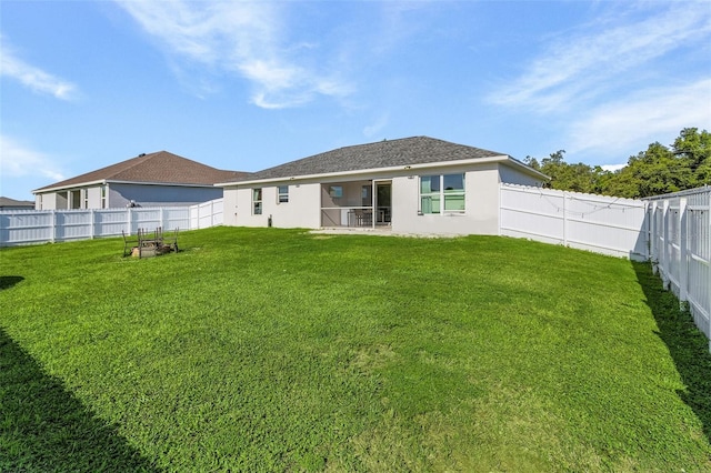 1731 NW 24th Pl, Cape Coral, FL 33993 - back of property with a fenced backyard and stucco siding