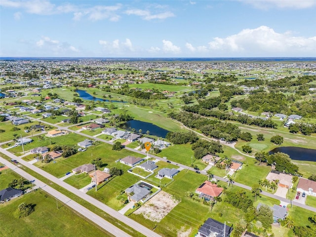 1731 NW 24th Pl, Cape Coral, FL 33993 - aerial view of property and surrounding area featuring nearby suburban area