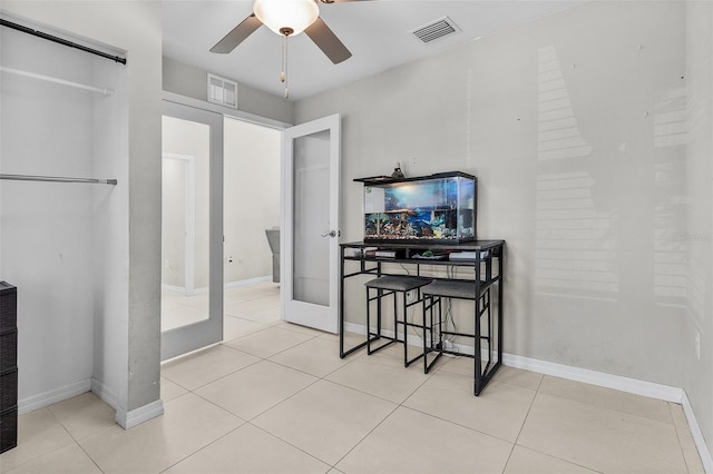 1731 NW 24th Pl, Cape Coral, FL 33993 - tiled dining room with french doors and ceiling fan
