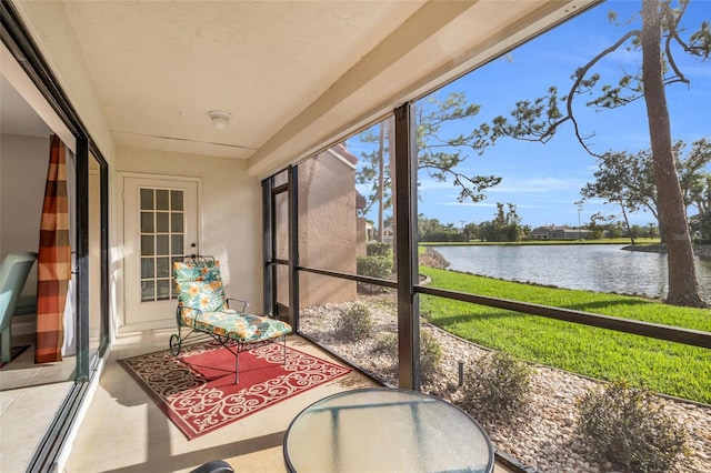 7150 Golden Eagle Ct Unit 213, Fort Myers, FL 33912 - sunroom featuring a water view