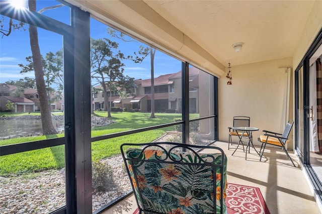 7150 Golden Eagle Ct Unit 213, Fort Myers, FL 33912 - sunroom with a residential view