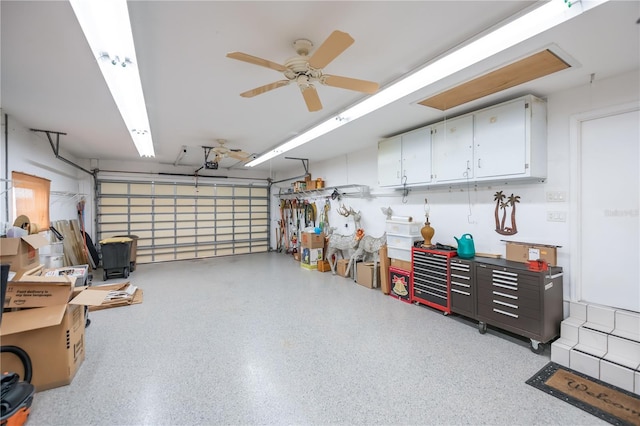 1418 Grebe Dr, Punta Gorda, FL 33950 - garage featuring a garage door opener and ceiling fan