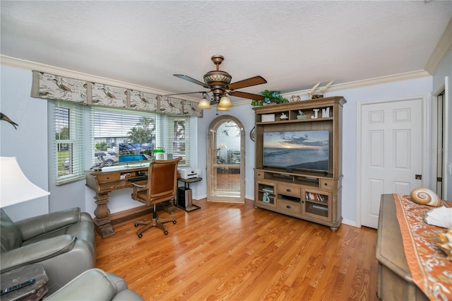 1418 Grebe Dr, Punta Gorda, FL 33950 - office space with a ceiling fan, healthy amount of natural light, light wood-type flooring, ornamental molding, and a textured ceiling
