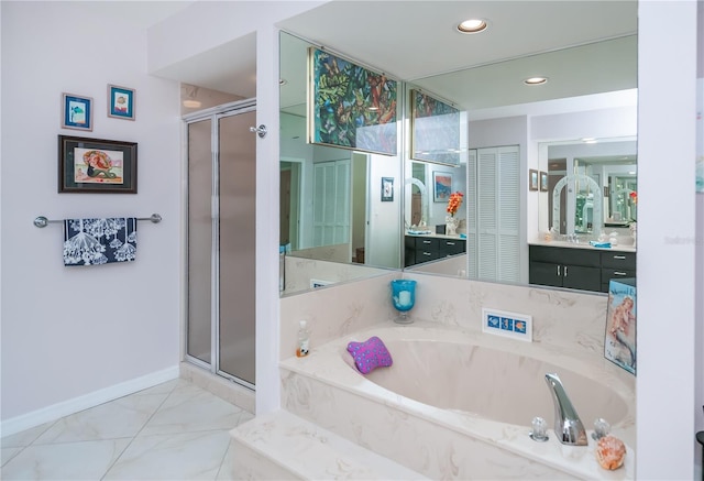 1418 Grebe Dr, Punta Gorda, FL 33950 - full bathroom with a garden tub, a stall shower, vanity, recessed lighting, and marble look tiles