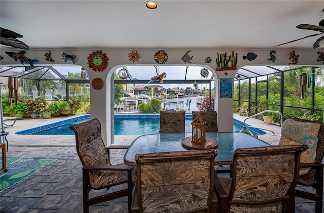 1418 Grebe Dr, Punta Gorda, FL 33950 - exterior space featuring a sunroom, a ceiling fan, and recessed lighting