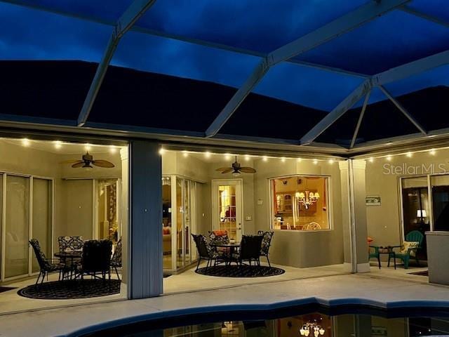 260 Rotonda Blvd E, Rotonda West, FL 33947 - rear view of house featuring a patio area, ceiling fan, an outdoor pool, and a lanai