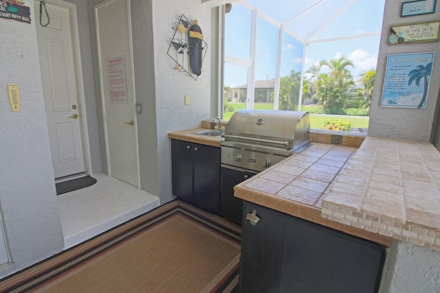 260 Rotonda Blvd E, Rotonda West, FL 33947 - view of patio / terrace with an outdoor kitchen and a lanai