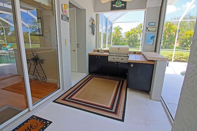 260 Rotonda Blvd E, Rotonda West, FL 33947 - view of patio / terrace with a sink and exterior kitchen