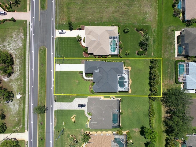260 Rotonda Blvd E, Rotonda West, FL 33947 - aerial view of property and surrounding area featuring property boundaries highlighted