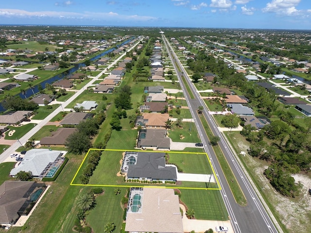 260 Rotonda Blvd E, Rotonda West, FL 33947 - aerial perspective of suburban area with property boundaries highlighted