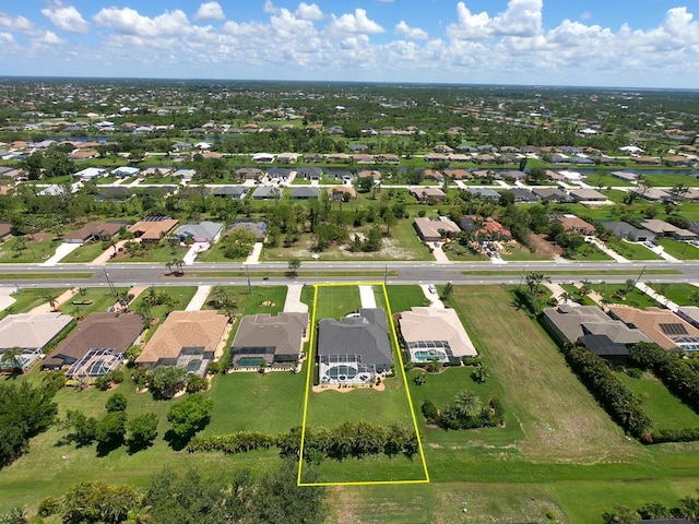 260 Rotonda Blvd E, Rotonda West, FL 33947 - aerial perspective of suburban area with property parcel outlined