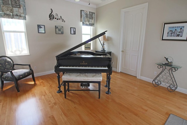 260 Rotonda Blvd E, Rotonda West, FL 33947 - living area featuring light wood finished floors and ornamental molding