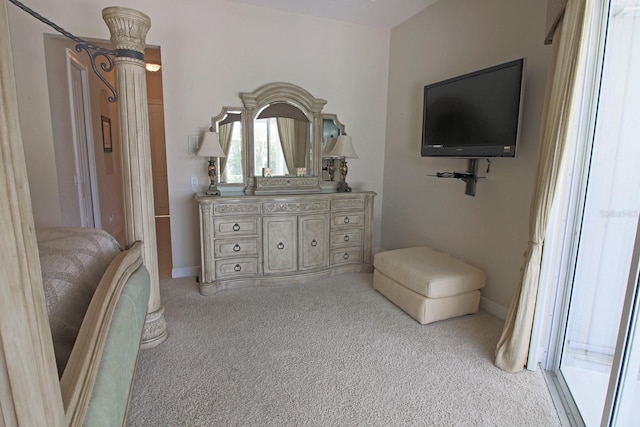 260 Rotonda Blvd E, Rotonda West, FL 33947 - carpeted bedroom with baseboards