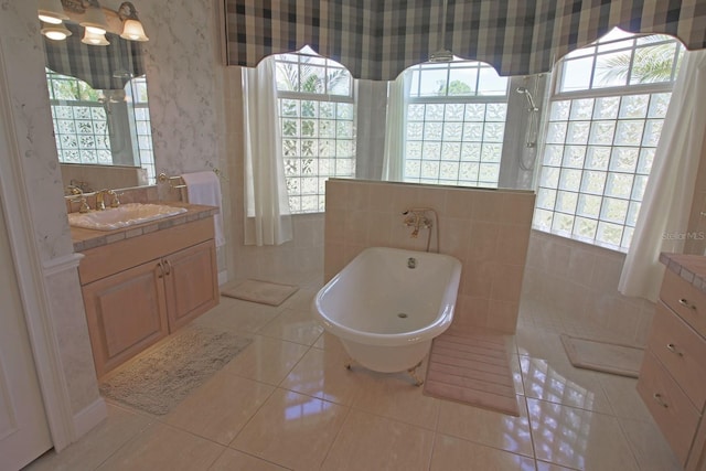 260 Rotonda Blvd E, Rotonda West, FL 33947 - full bath with vanity, a soaking tub, tile patterned floors, a walk in shower, and wallpapered walls