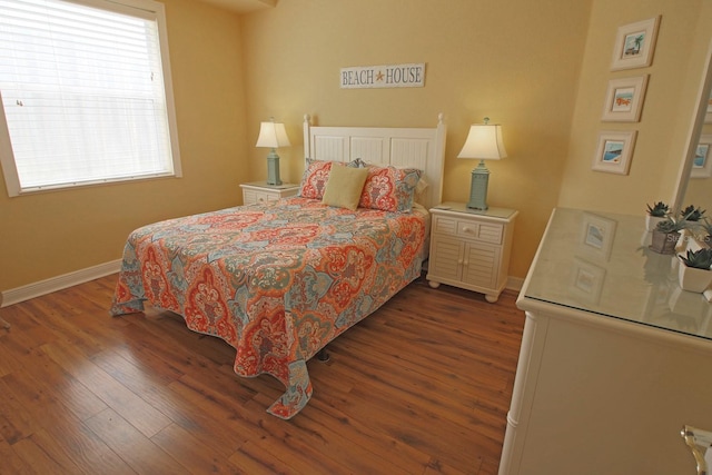 260 Rotonda Blvd E, Rotonda West, FL 33947 - bedroom featuring wood finished floors and baseboards