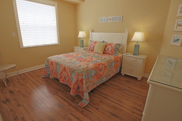 260 Rotonda Blvd E, Rotonda West, FL 33947 - bedroom with hardwood / wood-style flooring and baseboards