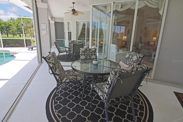260 Rotonda Blvd E, Rotonda West, FL 33947 - sunroom / solarium featuring ceiling fan and outdoor dining space