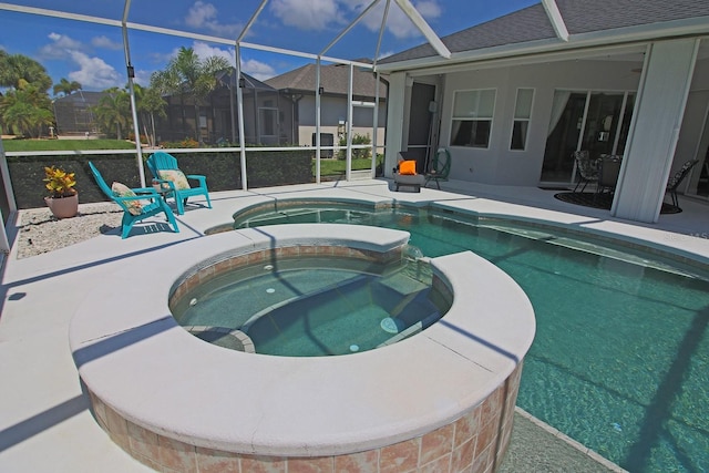260 Rotonda Blvd E, Rotonda West, FL 33947 - view of pool featuring a patio, a pool with connected hot tub, and glass enclosure