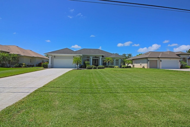 260 Rotonda Blvd E, Rotonda West, FL 33947 - single story home featuring an attached garage, a front lawn, and driveway