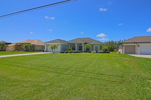 260 Rotonda Blvd E, Rotonda West, FL 33947 - ranch-style home featuring driveway, a front lawn, and an attached garage