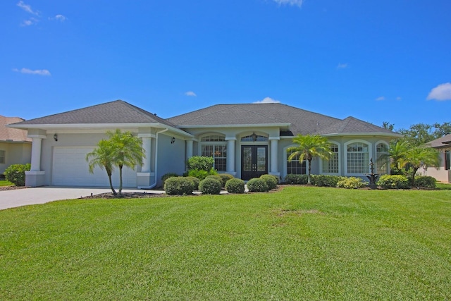 260 Rotonda Blvd E, Rotonda West, FL 33947 - ranch-style home featuring french doors, a garage, a front yard, concrete driveway, and stucco siding