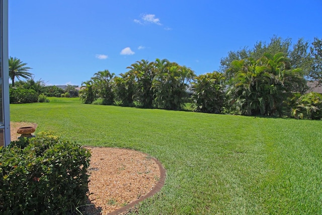 260 Rotonda Blvd E, Rotonda West, FL 33947 - view of grassy yard