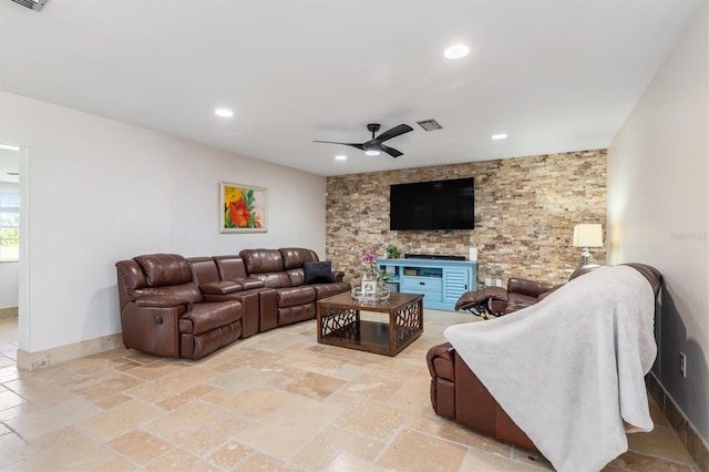 123 Annapolis Ln, Rotonda West, FL 33947 - living room with ceiling fan, recessed lighting, and stone tile floors
