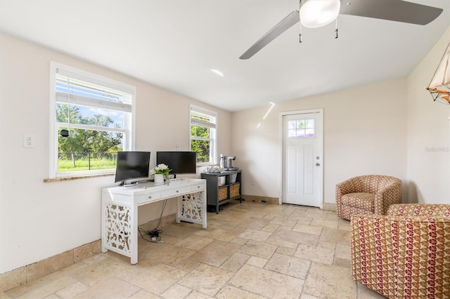 123 Annapolis Ln, Rotonda West, FL 33947 - home office featuring stone tile flooring and ceiling fan