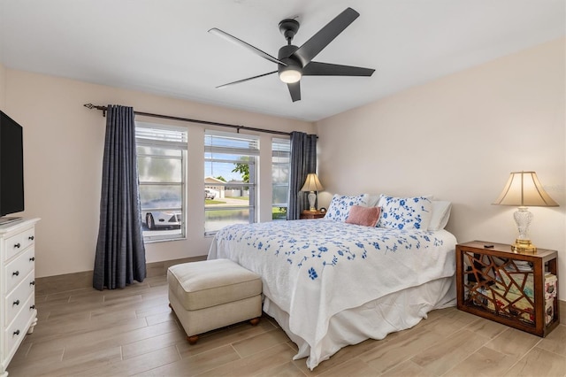 123 Annapolis Ln, Rotonda West, FL 33947 - bedroom featuring light wood-style floors and ceiling fan