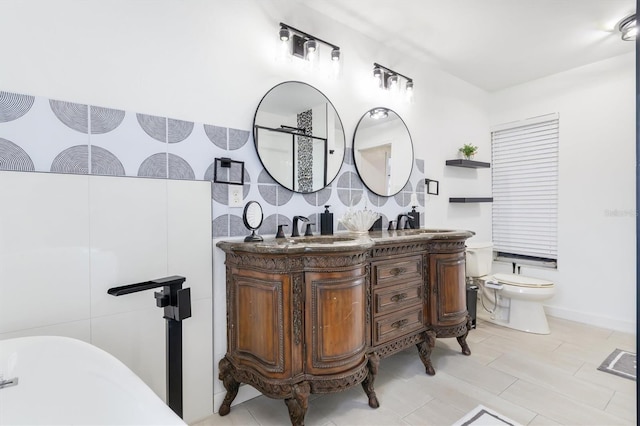 123 Annapolis Ln, Rotonda West, FL 33947 - full bathroom with double vanity and a freestanding tub