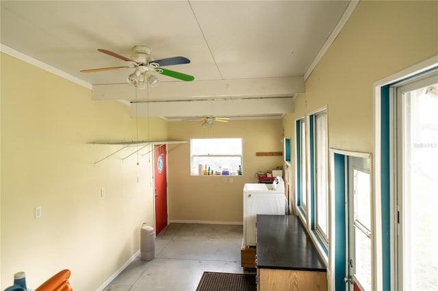 10724 SW Park Ave, Arcadia, FL 34269 - laundry room with a ceiling fan, washing machine and dryer, and crown molding