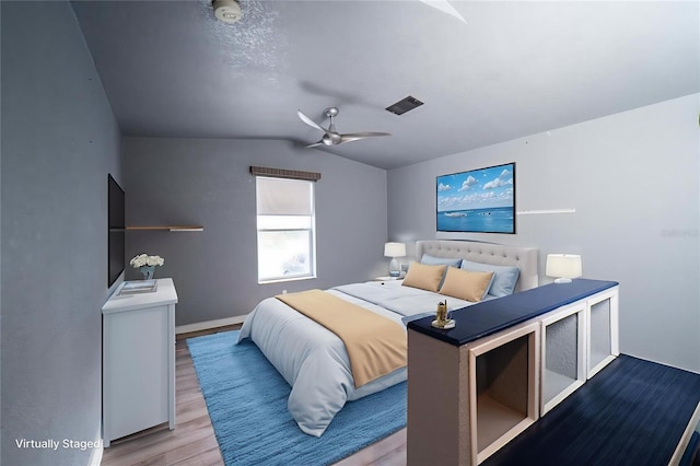 10724 SW Park Ave, Arcadia, FL 34269 - bedroom featuring lofted ceiling, wood finished floors, and a ceiling fan