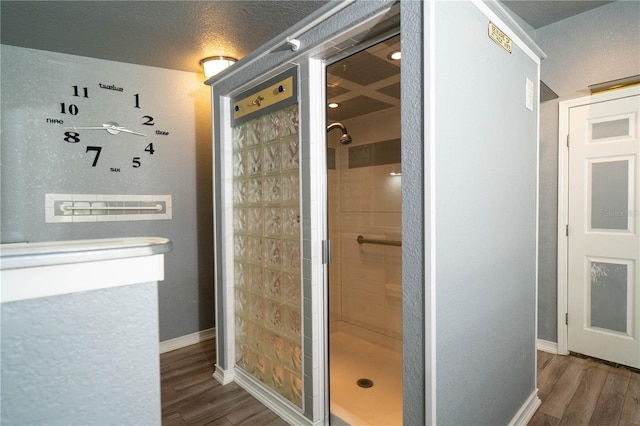 10724 SW Park Ave, Arcadia, FL 34269 - bathroom with a stall shower and wood finished floors