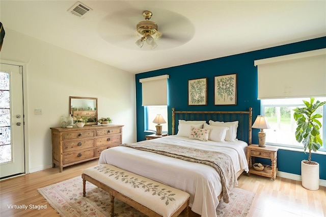 10724 SW Park Ave, Arcadia, FL 34269 - bedroom featuring wood finished floors and a ceiling fan