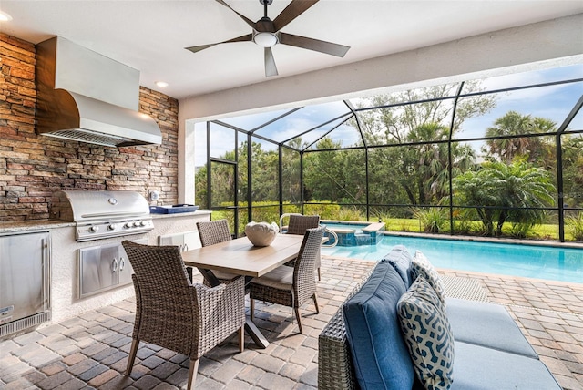 14684 Cherry Blossom Way, Punta Gorda, FL 33955 - view of patio / terrace featuring an outdoor kitchen, a ceiling fan, a pool with connected hot tub, a lanai, and outdoor dining area