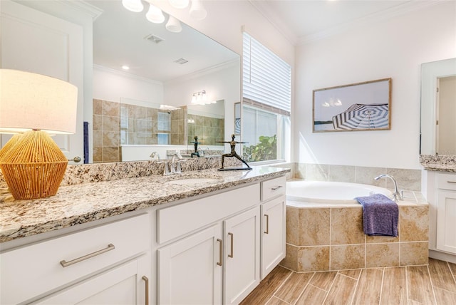 14684 Cherry Blossom Way, Punta Gorda, FL 33955 - full bathroom with vanity, crown molding, healthy amount of natural light, a bath, and wood finished floors