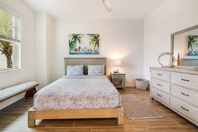 14684 Cherry Blossom Way, Punta Gorda, FL 33955 - bedroom featuring wood tiled floors and a ceiling fan