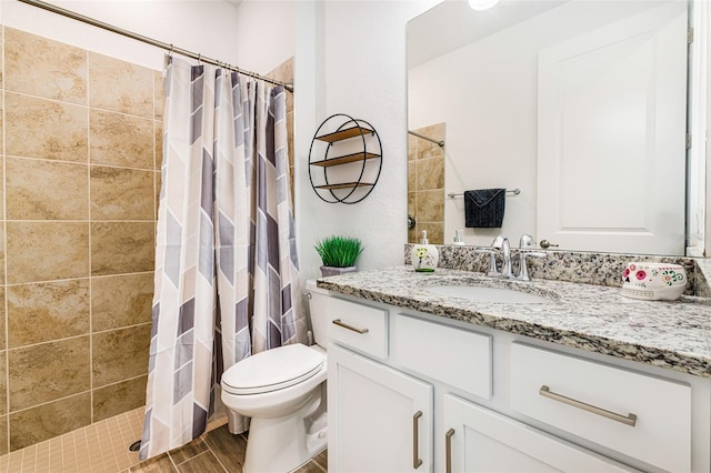 14684 Cherry Blossom Way, Punta Gorda, FL 33955 - full bathroom featuring vanity, a tile shower, and wood finished floors