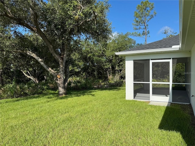 4863 Las Almanos Ave, North Port, FL 34288 - view of green lawn featuring a sunroom