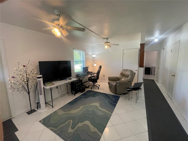 2336 Picnic St, Port Charlotte, FL 33952 - living room with a ceiling fan, a desk, and light tile patterned flooring