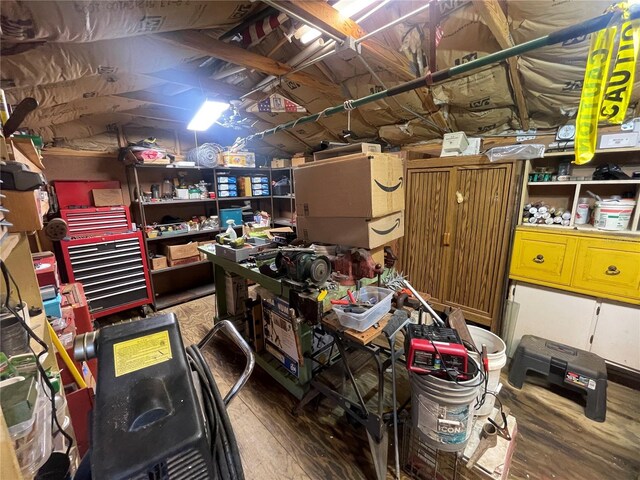 2336 Picnic St, Port Charlotte, FL 33952 - below grade area with wood finished floors and a workshop area