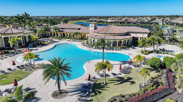 12425 Ghiberti Cir Unit 101, Venice, FL 34293 - community pool featuring a residential view