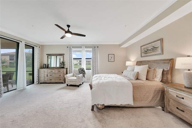 12425 Ghiberti Cir Unit 101, Venice, FL 34293 - bedroom with ornamental molding, light carpet, multiple windows, and ceiling fan