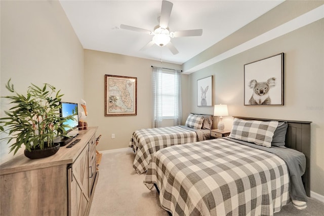 12425 Ghiberti Cir Unit 101, Venice, FL 34293 - bedroom with light carpet and ceiling fan
