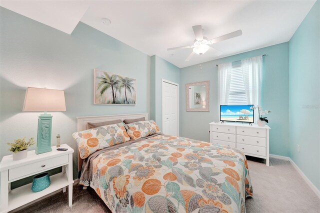 12425 Ghiberti Cir Unit 101, Venice, FL 34293 - carpeted bedroom featuring ceiling fan and a closet