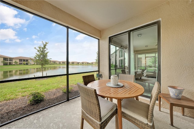 12425 Ghiberti Cir Unit 101, Venice, FL 34293 - sunroom featuring a water view