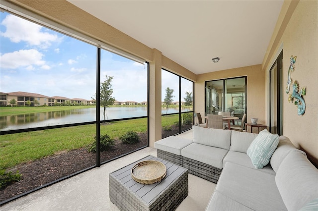 12425 Ghiberti Cir Unit 101, Venice, FL 34293 - sunroom featuring an outdoor hangout area and a water view