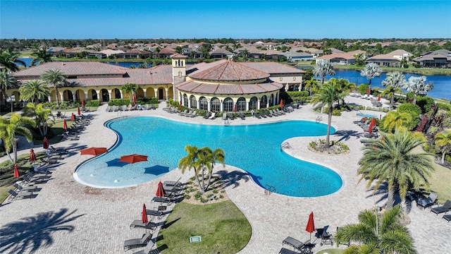 12425 Ghiberti Cir Unit 101, Venice, FL 34293 - community pool featuring a residential view and a water view