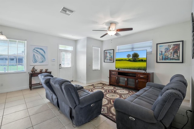 3116 SW 16th Pl, Cape Coral, FL 33914 - living room with a ceiling fan and light tile patterned flooring